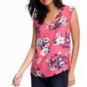 XS V-neck Hi-lo blouse. Pink/blue floral. Soft and silky sleeveless round hem.